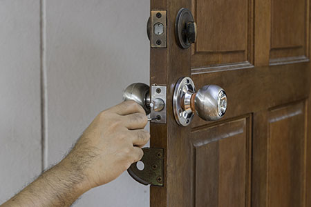 Locksmiths checking door lock health
